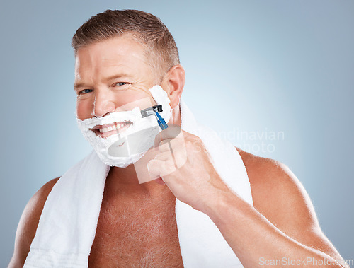 Image of Razor shave, man smile and portrait with cream for face cleaning, wellness and skincare. Morning grooming, foam and model with facial care and skin treatment for shaving hair in a studio isolated