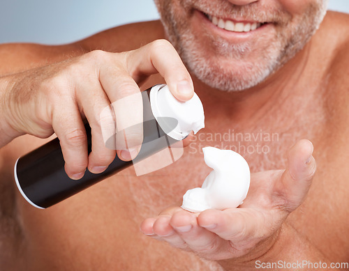 Image of Epilation, shaving cream and male in a studio for a hygiene, skincare and grooming face routine. Health, wellness and mature man with hair removal foam for a facial, self care and beauty treatment.