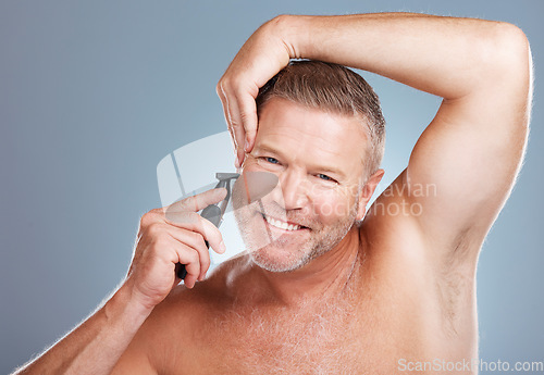 Image of Skincare, grooming and man with razor for beard for wellness, shaving and hygiene on grey background. Barber, cleaning and face portrait of male with shaver for facial beauty, haircare and self care