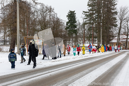 Image of People attend the Slavic Carnival Masopust