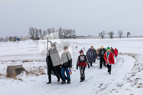 Image of People attend the Slavic Carnival Masopust