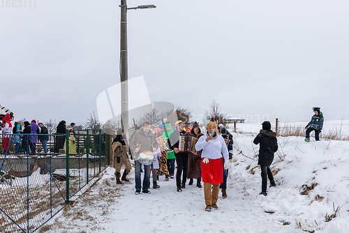 Image of People attend the Slavic Carnival Masopust