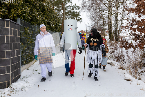 Image of People attend the Slavic Carnival Masopust