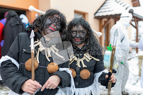 Image of People attend the Slavic Carnival Masopust