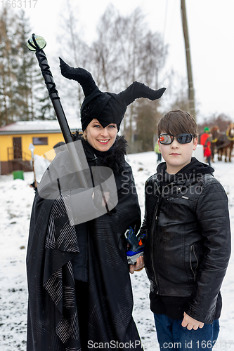 Image of People attend the Slavic Carnival Masopust