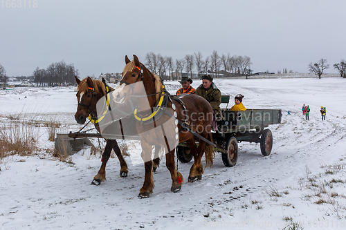 Image of People attend the Slavic Carnival Masopust