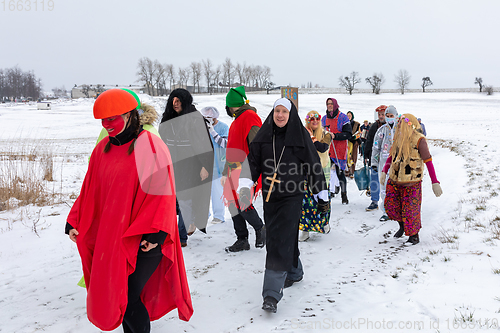 Image of People attend the Slavic Carnival Masopust