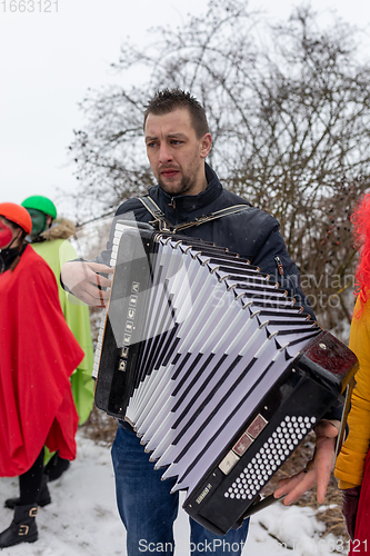 Image of People attend the Slavic Carnival Masopust