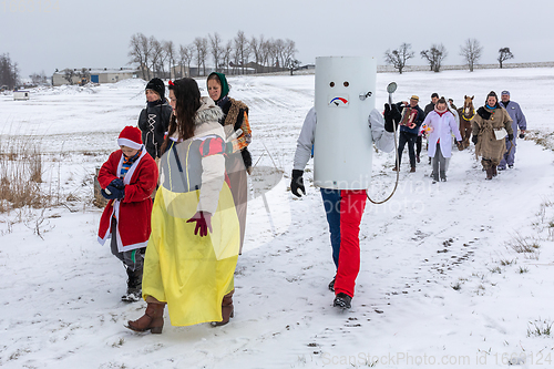 Image of People attend the Slavic Carnival Masopust