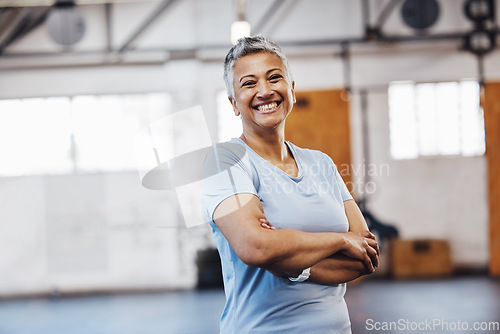 Image of Senior, black woman and gym portrait of a person happy about fitness, training and exercise. Sports, happy and pilates studio of mature female with arms crossed proud about wellness and health