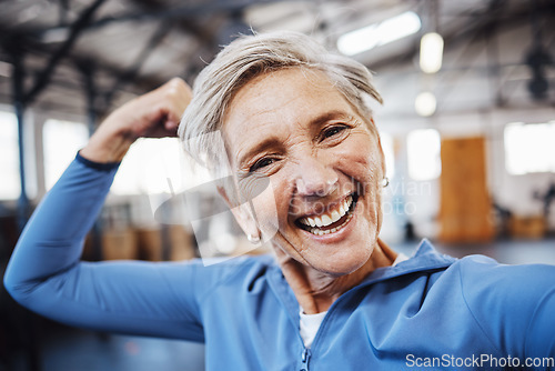 Image of Senior woman, flex and smile for selfie or profile picture in exercise, workout or muscle training at the gym. Portrait of happy elderly female face in fitness smiling for vlog, social media or post