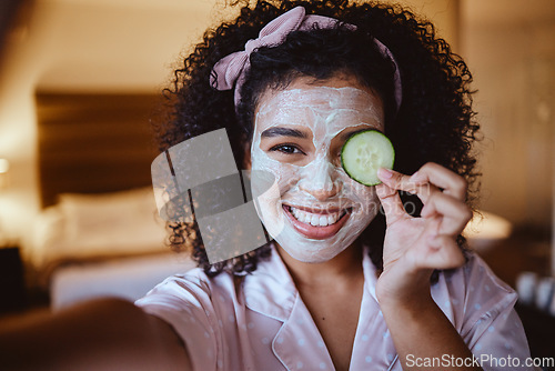 Image of Portrait, selfie and cucumber with woman for mask, happy and smile with facial, skincare or grooming in bedroom. Face, fruit and photo by girl relax with raw, vegan and eco product for skin detox