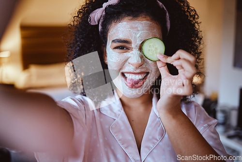 Image of Selfie, portrait and cucumber for skincare by woman, happy and emoji, fun and silly while grooming, mask or facial. Face, fruit and girl with tongue out for photo, beauty or routine with eco product