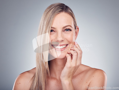 Image of Woman, portrait and happiness, beauty and hair, hairstyle cosmetic care and smile isolated on studio background. Makeup, natural cosmetics and keratin treatment, dermatology and shine with skincare