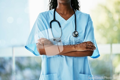 Image of Black woman, doctor and stethoscope with arms crossed of healthcare consultant, advise or insurance outside. Hands of confident African American female medical expert or nurse in health and wellness