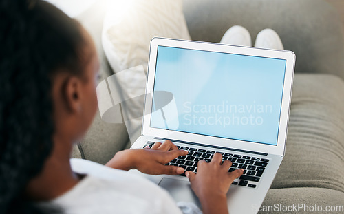 Image of Mockup screen, black woman working on laptop for communication, marketing advertising or networking in home living room. Digital, space or girl typing on tech for social media, website or internet