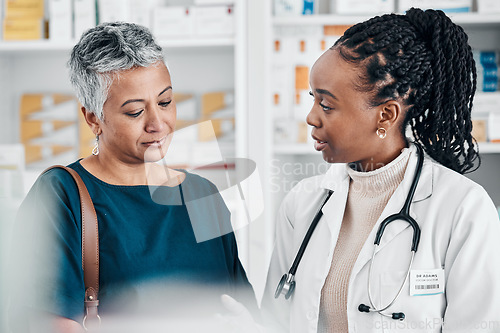 Image of Questions, pharmacy or old woman consulting with a pharmacist for retail healthcare information. Medicine, trust or doctor helping a sick senior person shopping for medication, pills or medical drugs