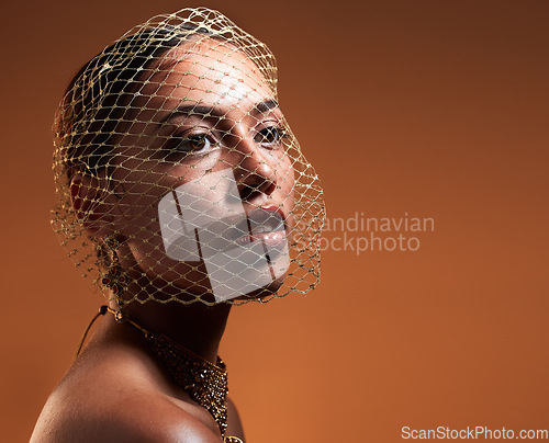 Image of Net veil, elegance and face of a woman with fashion idea isolated on a brown studio background. Thinking, makeup and stylish vintage model with a fancy, retro and glamour accessory with mockup space