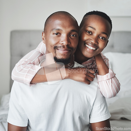 Image of Portrait, love and black couple in bedroom, smile and romance for Valentines day, affection and hug. Romantic, man and woman embrace on bed, loving and bonding on weekend break and relax together