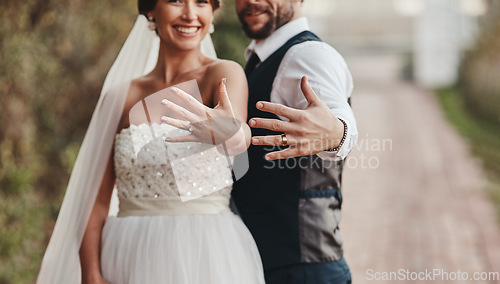 Image of Love, couple and showing ring outdoor, happiness and celebration for relationship, achievement and loving. Romance, man and happy woman with diamonds, bonding and romantic on wedding day and ceremony
