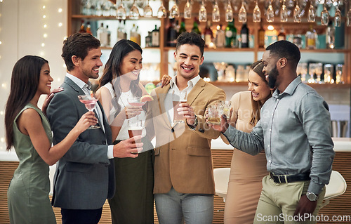 Image of Group, friends and toast for celebration, party and happiness together, smile and bonding. Young people, diversity and team in restaurant, cheers and alcohol for event, congrats or success with smile