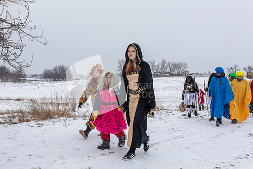 Image of People attend the Slavic Carnival Masopust