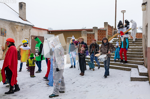 Image of People attend the Slavic Carnival Masopust