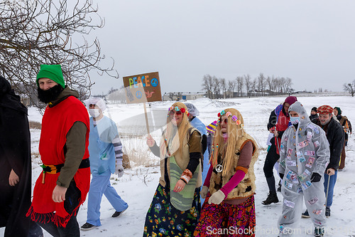 Image of People attend the Slavic Carnival Masopust