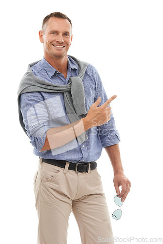 Image of Man, hand and pointing for product placement standing isolated against a white studio background. Portrait of happy male with smile showing gesture or pointed finger for advertisement on mockup