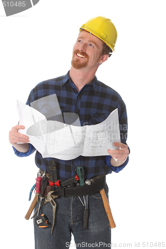 Image of construction worker with architectural plans 