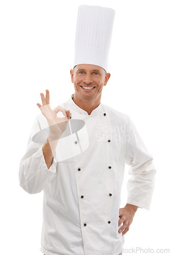 Image of Portrait of chef, man with ok hand gesture and confident smile, cafe owner isolated on white background. Happy executive cook, uniform tasty emoji for restaurant discount deal or promotion in studio.