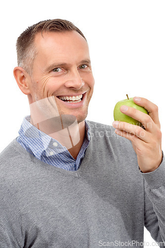 Image of Man, eating apple and studio portrait with fruit for health, diet and wellness isolated on a white background. Model person with nutrition vegan food for healthy lifestyle, motivation and happy smile