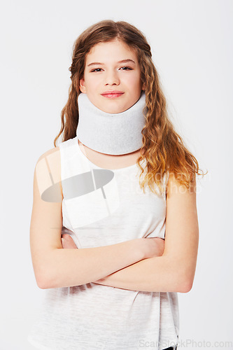 Image of Portrait, woman or neck brace from accident, injury or recovery with girl isolated on white studio background. Face, female arms crossed or lady with medical collar, healthcare or support on backdrop