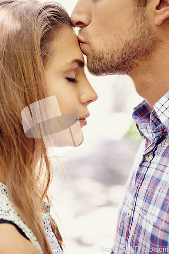 Image of Love, couple and forehead kiss, park and happiness for relationship, dating and quality time outdoor. Romance, man and woman with affection, loving or bonding with romantic gesture or kissing on head