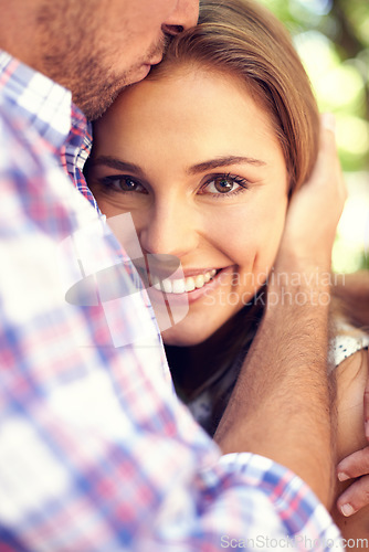 Image of Happy couple, hug woman and portrait in park closeup on valentines date, love and romance with smile. Man, kiss and outdoor embrace for dating, romantic adventure and bonding with care in sunshine