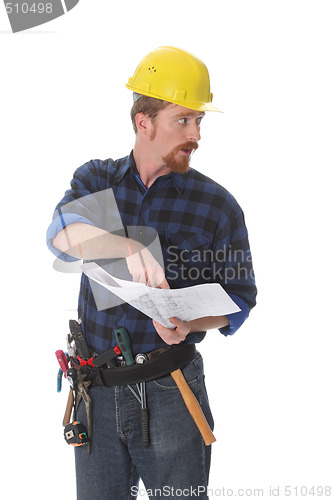 Image of construction worker pointing on architectural plans