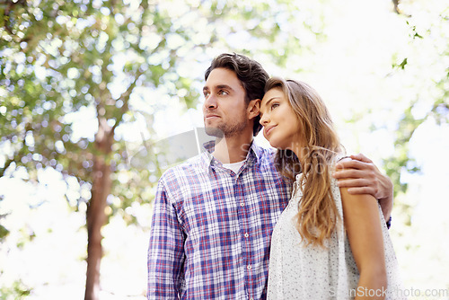 Image of Low angle, couple or hug on love date, valentines day or bonding in nature park, backyard or relax garden. Thinking, happy or embrace man and woman in trust, marriage security or partnership support