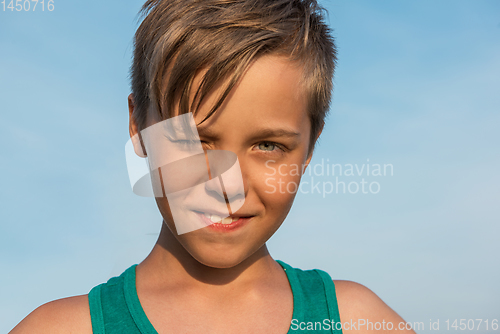Image of Closeup portrait of a boy in summer day.