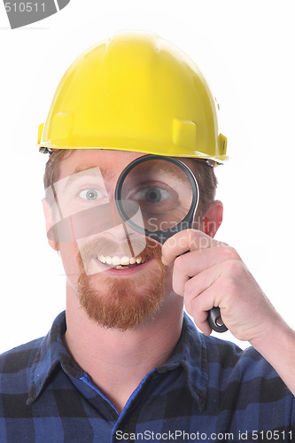 Image of construction worker with loupe