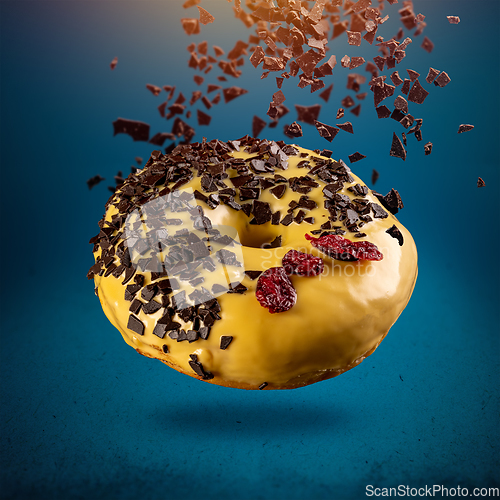 Image of Flying donut in yellow glaze