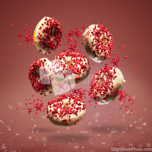 Image of Flying donuts glazed with white chocolate