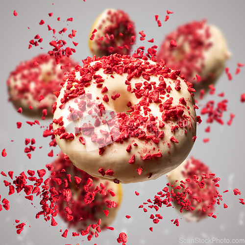 Image of Flying donuts glazed with white chocolate