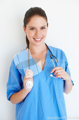 Image of Studio portrait, stethoscope and nurse happy for nursing career, medical healthcare or cardiology health. Medicine doctor, caregiver woman or hospital surgeon with smile isolated on white background