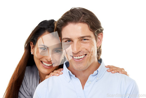 Image of Love, hug and portrait of a couple in a studio for valentines day, romance or anniversary. Happy, smile and young interracial man and woman embracing with happiness isolated by a white background.