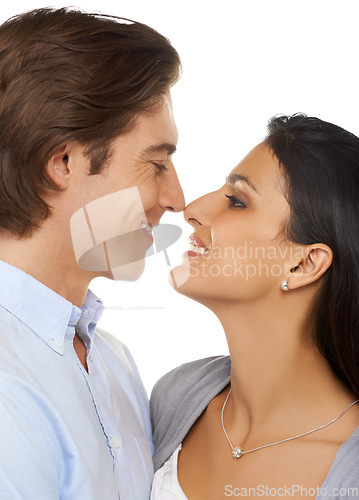 Image of Couple, hug and smile for valentines day embrace, love or date in affection isolated against white studio background. Happy man and woman smiling in relationship for special month of intimate romance