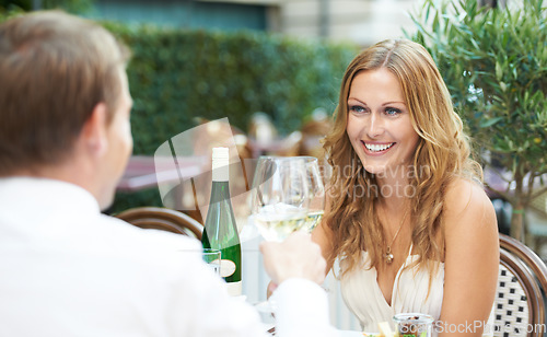 Image of Love, drinks and wine, couple cheers on date for valentines day, luxury occasion to celebrate romance and happy relationship. Valentine, man and woman toast glasses in romantic restaurant in Paris.