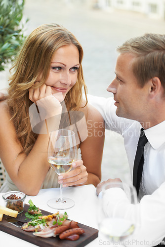 Image of Love, food and wine, couple on date for valentines day, luxury occasion to celebrate romance and happy relationship. Valentine, man and woman eating and drinking in elegant restaurant or Paris cafe.