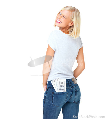 Image of Portrait, woman and cash in pocket, wink and casual outfit with female isolated on white studio background. Face, lady and happy girl with money, finance and wealth with dollars, winning and backdrop