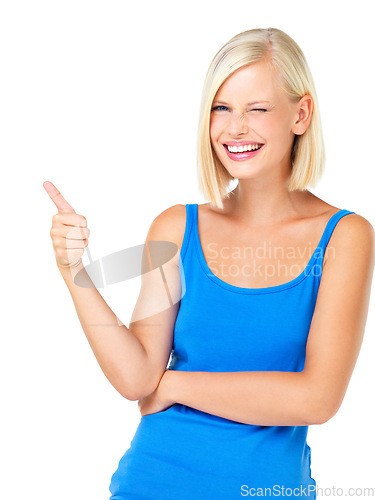 Image of Happy woman, portrait smile and thumbs up for good job, deal or well done isolated against a white studio background. Blond female standing and showing thumbsup hand gesture with wink for agreement