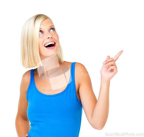 Image of Pointing, wow and deal with woman and mockup for promotion, branding and advertising. Smile, offer and vision with face of customer on white background studio for presentation, choice and referral